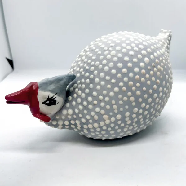 Spotted Fowl_Crouching